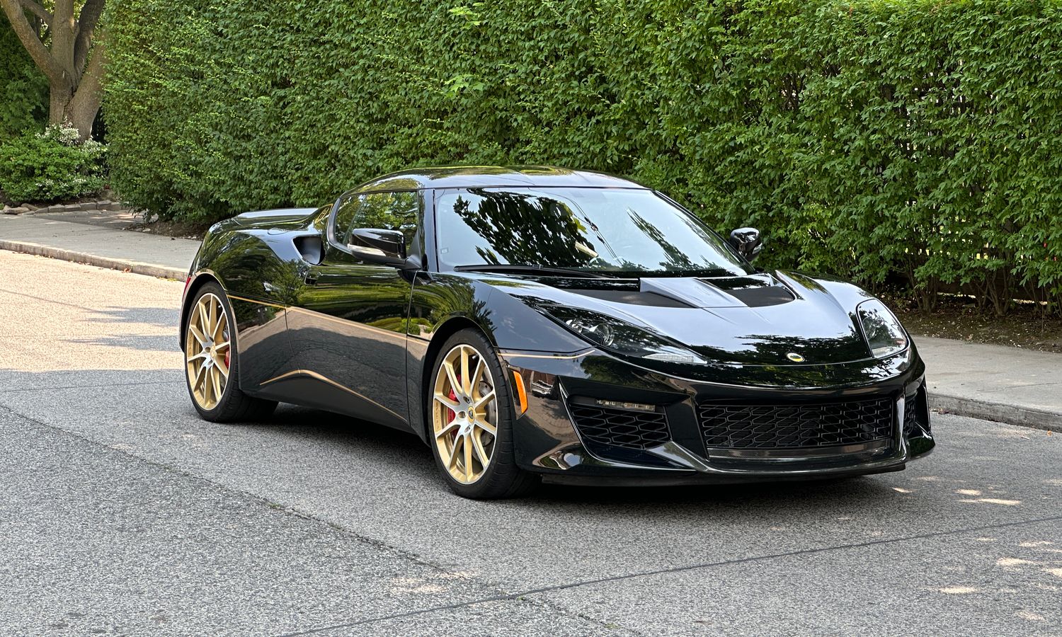 2017 Lotus  Evora 400 Black metallic and Gold John Player Special livery Exterior